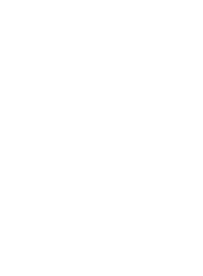 A honey dipper being raised from a full jar of honey.